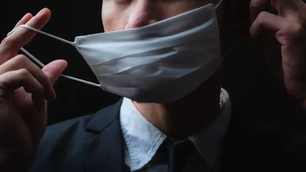 Man with COVID mask